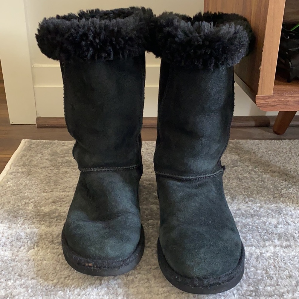 Tall black UGG boots